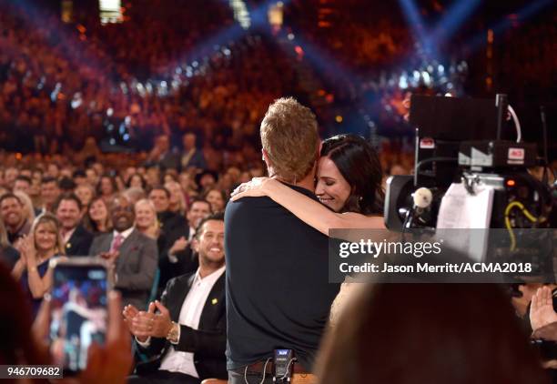 Dierks Bentley embraces Cassidy Black during the 53rd Academy of Country Music Awards at MGM Grand Garden Arena on April 15, 2018 in Las Vegas,...