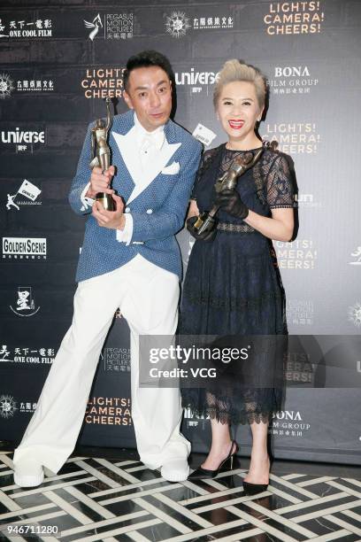 Actress Deanie Ip and actor Philip Keung pose with the Best Supporting Actress award and the Best Supporting Actor award at the after party of the...