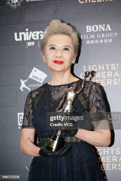 Actress Deanie Ip poses with the Best Supporting Actress award at the after party of the 37th Hong Kong Film Awards ceremony on April 15, 2018 in...