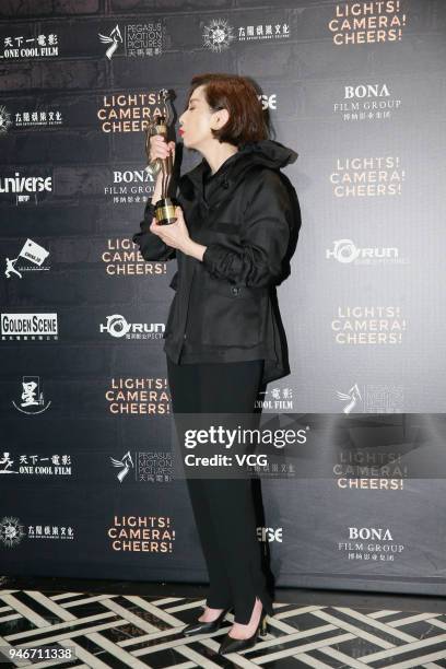 Actress Teresa Mo poses with the Best Actress award at the after party of the 37th Hong Kong Film Awards ceremony on April 15, 2018 in Hong Kong,...