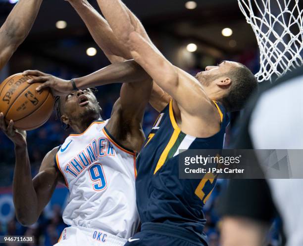 Jerami Grant of the Oklahoma City Thunder goes up for a shot against Rudy Gobert of the Utah Jazz during the second half of Game 1 of the NBA Western...