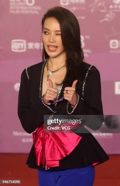 Actress Shu Qi, jury of the 8th Tiantan Award, arrives at red carpet during the Opening Ceremony of 2018 Beijing International Film Festival on April...