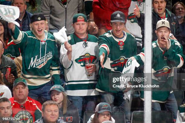 Fans cheer on the Minnesota Wild against the Winnipeg Jets in Game Three of the Western Conference First Round during the 2018 NHL Stanley Cup...