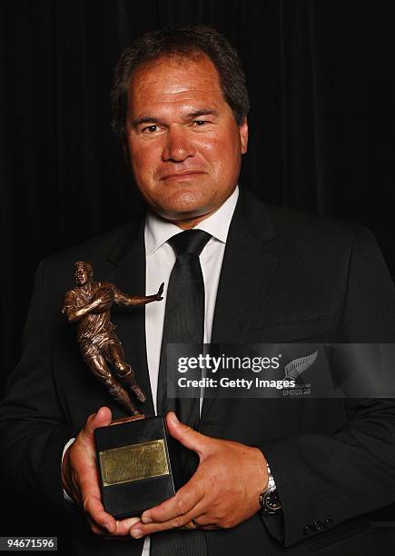 Dave Rennie poses for a photograph with his trophy for New Zealand Rugby Coach of the Year during the 2009 Steinlager New Zealand Rugby Awards at Sky...