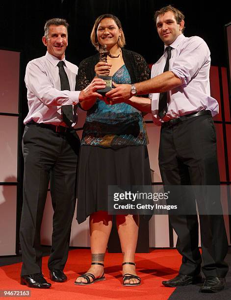 Valerie Vili presents Canterbury coach Rob Penney and Captain George Whitelock with the adidas Team of the Year trophy during the 2009 Steinlager New...