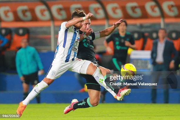 Sebastian Palacios of Pachuca struggle for the ball against Carlos Izquierdoz of Santos during the 15th round match between Pachuca and Santos Laguna...