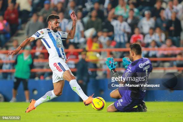 Franco Jara of Pachuca struggles for the ball against Jonathan Orozco of Santos during the 15th round match between Pachuca and Santos Laguna as part...
