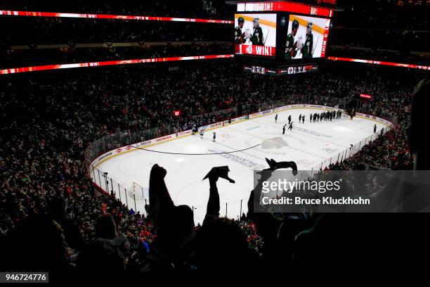 Fans celebrate the Minnesota Wild win against the Winnipeg Jets in Game Three of the Western Conference First Round during the 2018 NHL Stanley Cup...