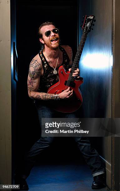 Jesse 'The Devil' Hughes of Eagles of Death Metal poses for a portrait session, playing a Maton guitar, on March 16th 2007 in Melbourne, Australia.