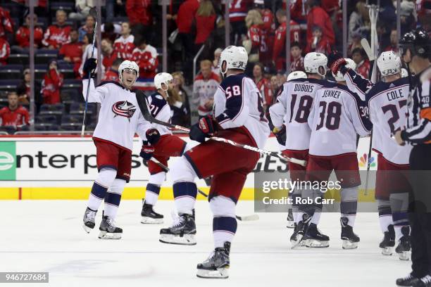 Zach Werenski of the Columbus Blue Jackets celebrates after the Blue Jackets defeated the Washington Capitals 5-4 in overtime during Game Two of the...