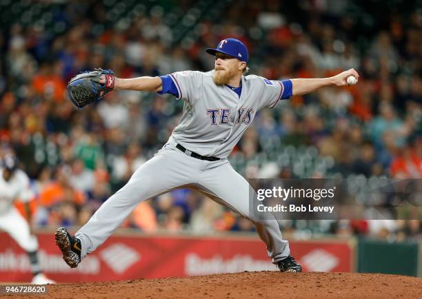 Jake Diekman of the Texas Rangers pitches in the tenth inning against the Houston Astros at Minute Maid Park on April 15, 2018 in Houston, Texas. All...