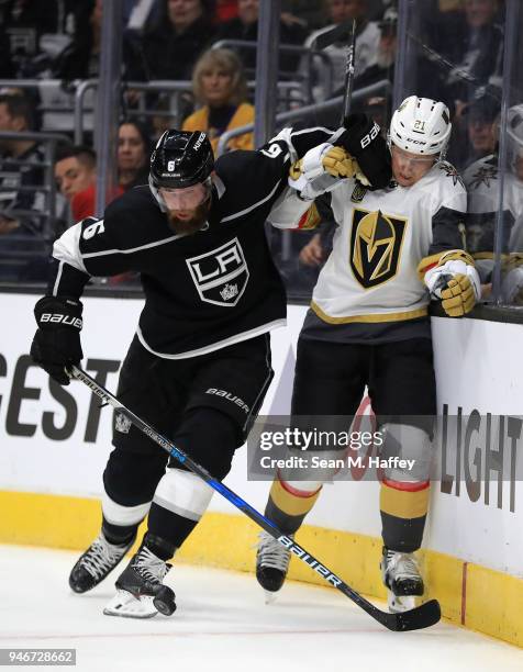 Jake Muzzin of the Los Angeles Kings battles Cody Eakin of the Vegas Golden Knights for postion during the first period in Game Three of the Western...