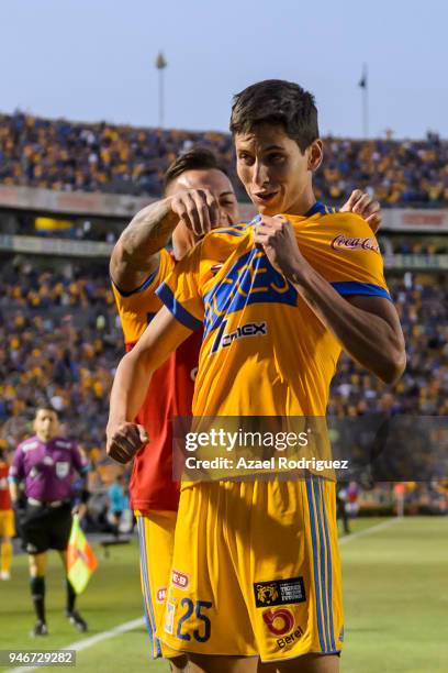 Jurgen Damm of Tigres celebrates with teammates after scoring his team's first goal during the 15th round match between Tigres UANL and Cruz Azul as...