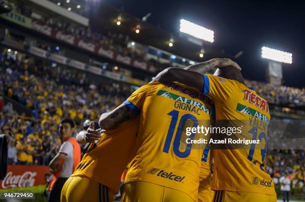 Eduardo Vargas of Tigres celebrates with teammates after scoring his team's second goal during the 15th round match between Tigres UANL and Cruz Azul...