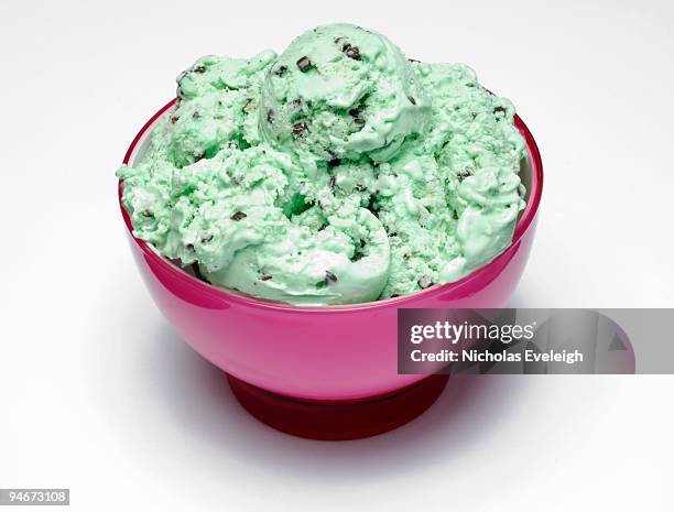 mint ice cream in a bowl - mint ice cream stock pictures, royalty-free photos & images