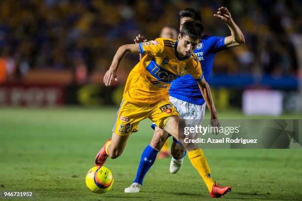 Jurgen Damm of Tigres fights for the ball with Angel Mena of Cruz Azul during the 15th round match between Tigres UANL and Cruz Azul as part of the...