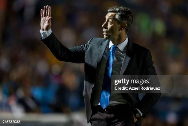 Pedro Caixinha, coach of Cruz Azul, gets out of the field after being expeled during the 15th round match between Tigres UANL and Cruz Azul as part...