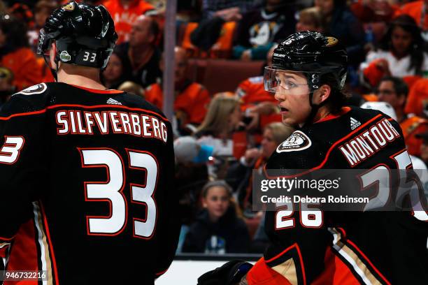 Brandon Montour of the Anaheim Ducks chats with Jakob Silfverberg before a face-off in Game One of the Western Conference First Round against the San...