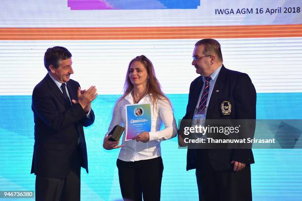 Athelete Of The Year laureate Larysa Soloviova of Ukraine is applauded by the IWGA President and International Canoe Federation President Jose...