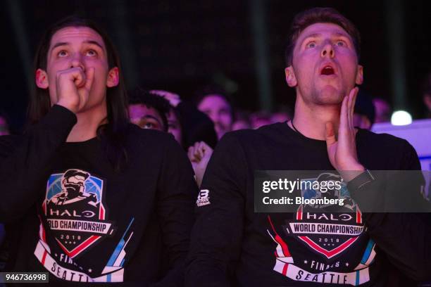 Fans react as they watch the grand final game between teams Tox and Splyce during the Halo World Championship finals in Seattle, Washington, U.S., on...