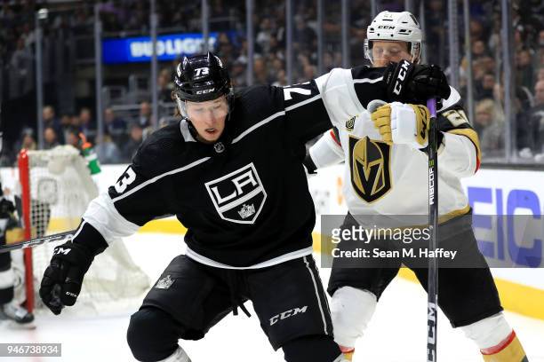 Tyler Toffoli of the Los Angeles Kings pushes Shea Theodore of the Vegas Golden Knights during the second period in Game Three of the Western...