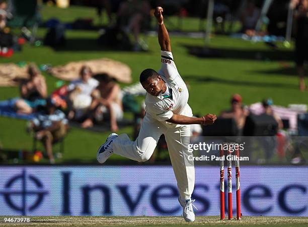 Makhaya Ntini of South Africa bowls the first ball of England's innings on his 100th test cap during day two of the first test match between South...