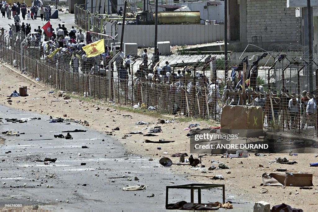 Lebanese protesters wave Hezbollah and A