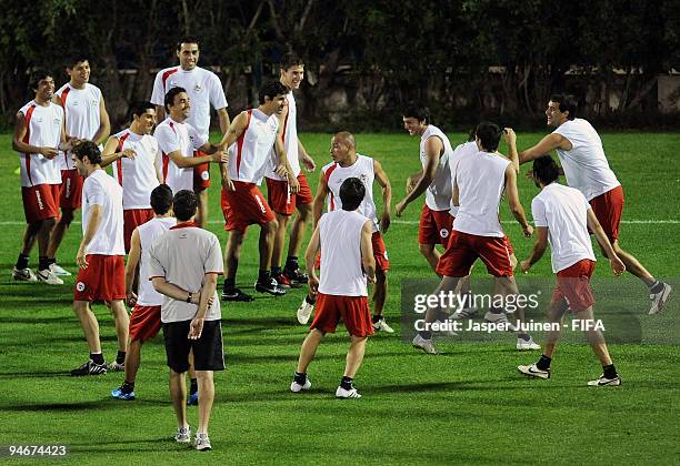 Estudiantes players fool arround during a training session on December 17, 2009 in Abu Dhabi, United Arab Emirates. Estudiantes will face Barcelona...