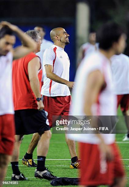 Juan Veron of Estudiantes smiles amid his team mates during a training session on December 17, 2009 in Abu Dhabi, United Arab Emirates. Estudiantes...
