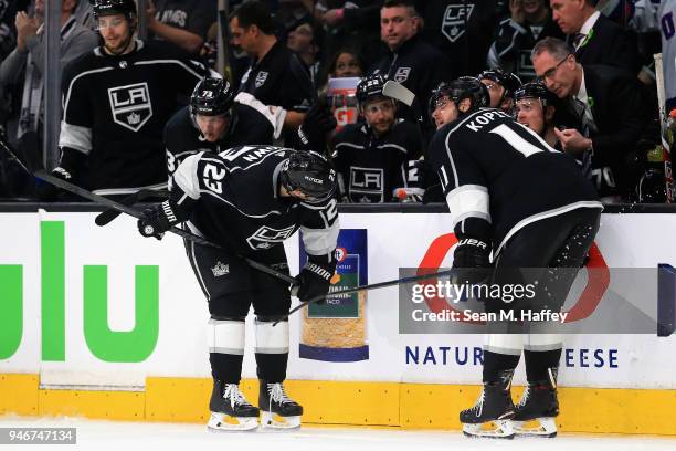 Anze Kopitar and Dustin Brown of the Los Angeles Kings look on during the third period in Game Three of the Western Conference First Round against...