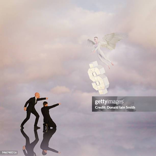 angel investor: angel arrives with floating dollar sign watched by two business men in suits - angel investor stock-fotos und bilder