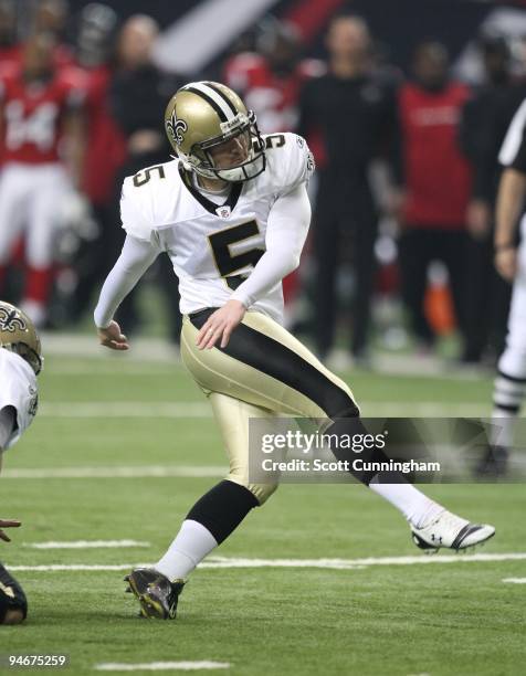 Garrett Hartley of the New Orleans Saints kicks against the Atlanta Falcons at the Georgia Dome on December 13, 2009 in Atlanta, Georgia. The Saints...