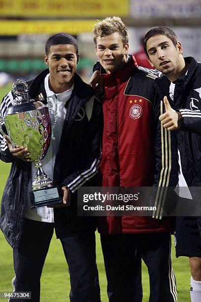 Players from the German Under-18 squad celebrate their victory after an international friendly match against Israel on December 17, 2009 in Kfar...