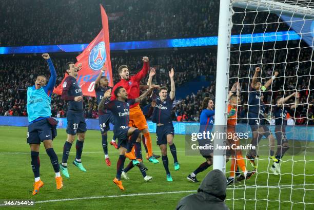 Players of PSG celebrate winning the French Championship following the Ligue 1 match between Paris Saint Germain and AS Monaco at Parc des Princes...