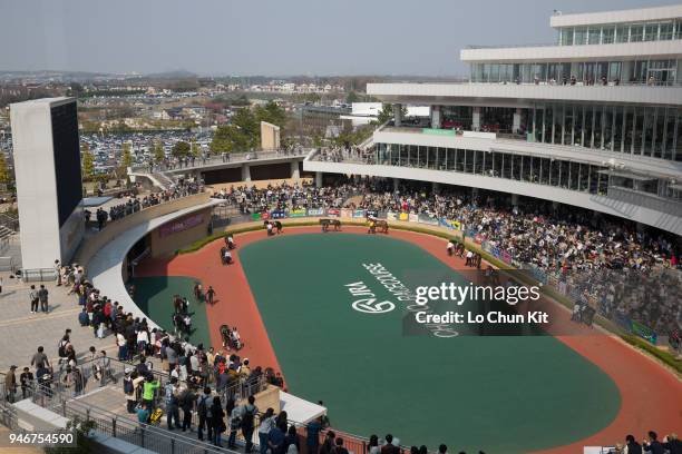 Horses are paraded around the paddock prior to a race at the Chukyo Racecourse during the Takamatsunomiya Kinen race day on March 25, 2018 in...