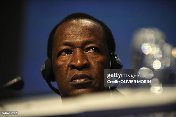 Burkina Faso's President Blaise Compare gives a press conference at the Bella Center in Copenhagen on December 17, 2009 on the 11th day of the COP15...