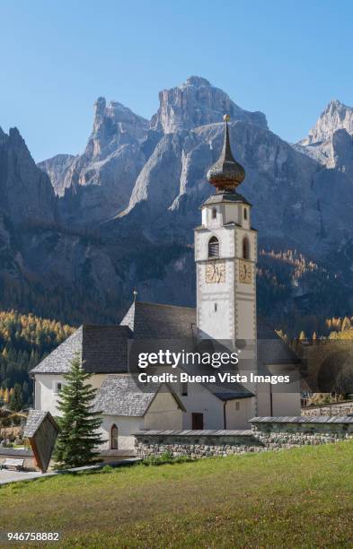 little church in a mountain village. - colfosco stockfoto's en -beelden