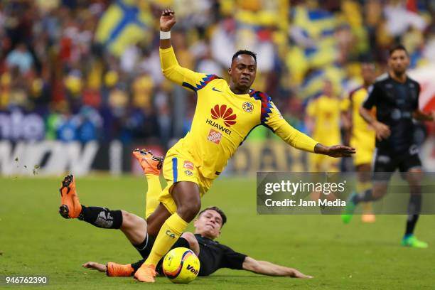 Alex Renato Ibarra del America fights for the ball with Arturo Gonzalez of Monterrey during the 15th round match between America and Monterrey as...