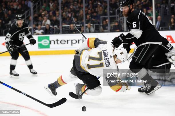 Jake Muzzin of the Los Angeles Kings defends against William Karlsson of the Vegas Golden Knights during the third period in Game Three of the...