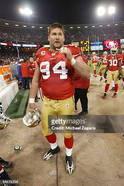 Justin Smith of the San Francisco 49ers on the sideline during the NFL game against the Arizona Cardinals at Candlestick Park on December 14, 2009 in...