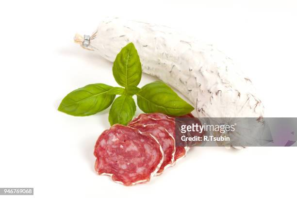 salami sliced isolated on the white background - embutido stock-fotos und bilder