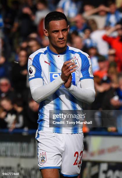 Tom Ince of Huddersfield Town applauds the fans at the end of the Premier League match between Huddersfield Town and Watford at John Smith's Stadium...