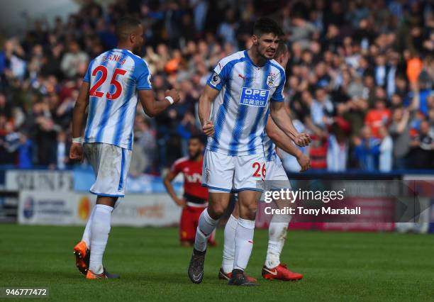 Christopher Schindler of Huddersfield Town celebrates their win at the final whistle during the Premier League match between Huddersfield Town and...