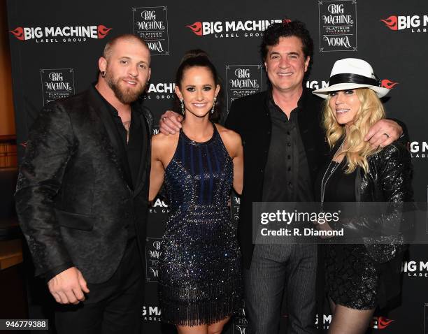 Brantley Gilbert, Amber Gilbert, Big Machine Records CEO Scott Borchetta, and Sandi Borchetta attend the 53rd Annual ACM Awards celebration with Big...