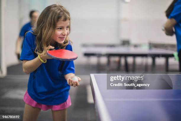 girl playing table tennis - table tennis stock pictures, royalty-free photos & images