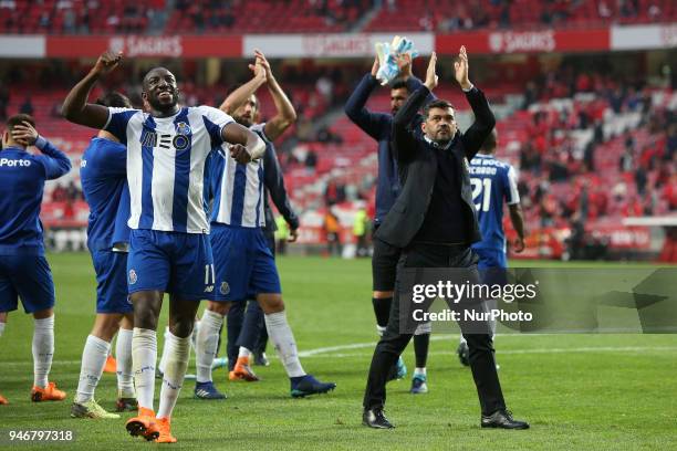 Porto's forward Moussa Marega from Mali and Porto's head coach Sergio Conceicao celebrate the victory at the end of the Portuguese League football...