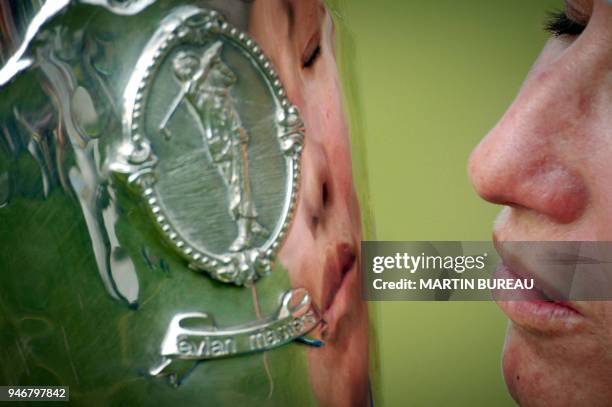 Australian Karrie Webb kisses her trophy, 29 July 2006 in Evian-Les-Bains, central eastern France, on the last of the four days of the Golf Evian...