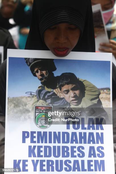 Dozen of representative from worker organization held a demonstration outside the US Embassy in Jakarta on Monday, April 16, 2018. Demonstrations...