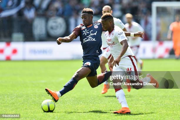 Nordi Mukiele of Montpellier and Francois Kamano of Bordeaux during the Ligue 1 match between Montpellier and Bordeaux at Stade de la Mosson on April...