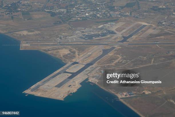View of Thessaloniki Airport or Makedonia Airport through airplane window on August 27, 2017 in Thessaloniki, Greece. The airport is the third...